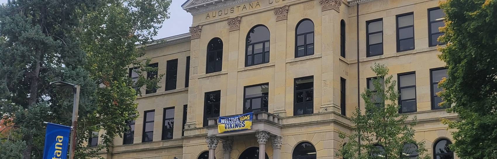 An event being set up and hosted outside of a local university.