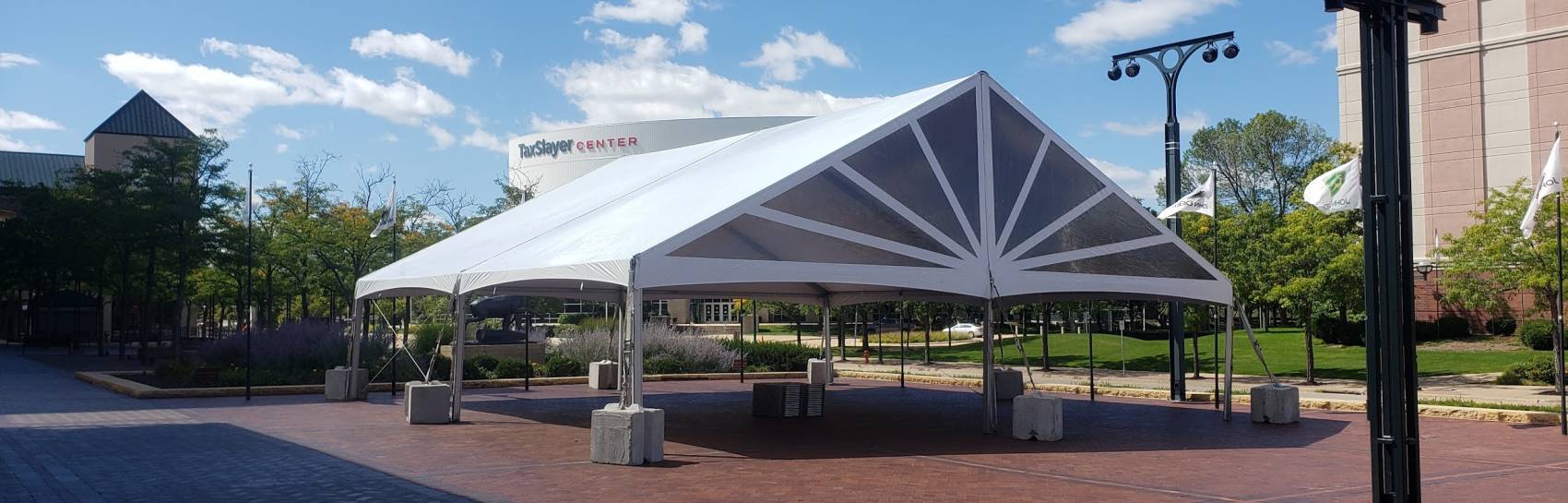 A tent set up for an event at the john deere commons in moline.