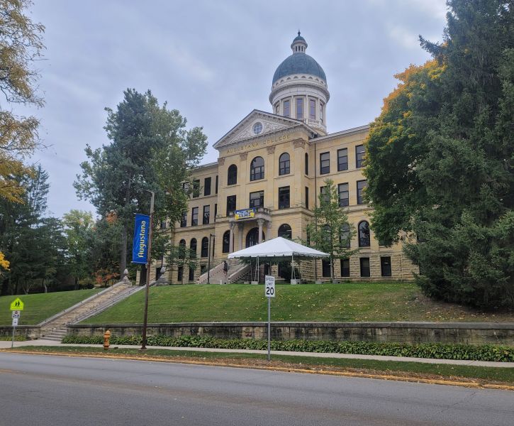 A tent being set up for an event at a local college.